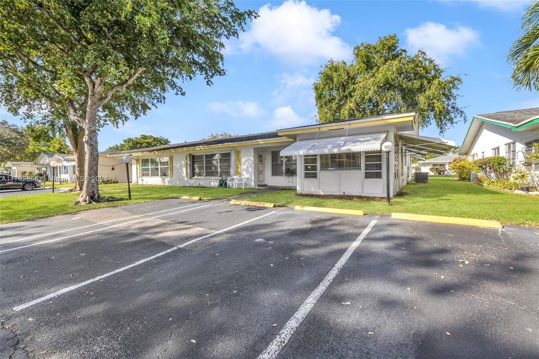 2 ASSIGNED PARKING SPACES NEAR ENTRANCE TO UNIT