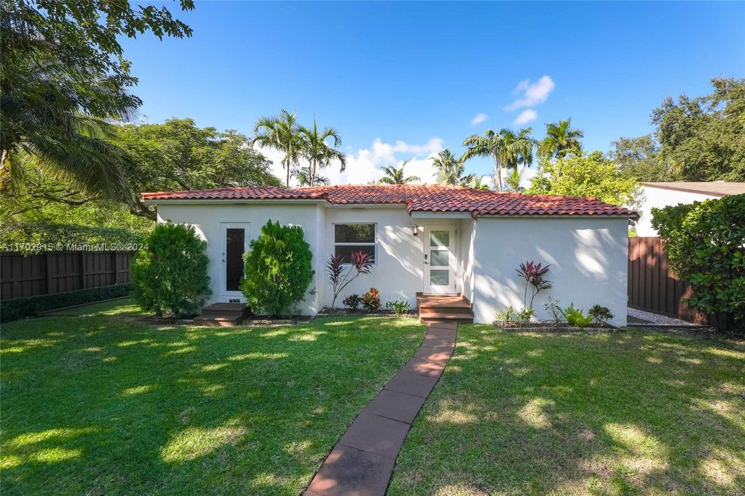 Front home view, fully fenced-in corner lot front patio and rear backyard with pool