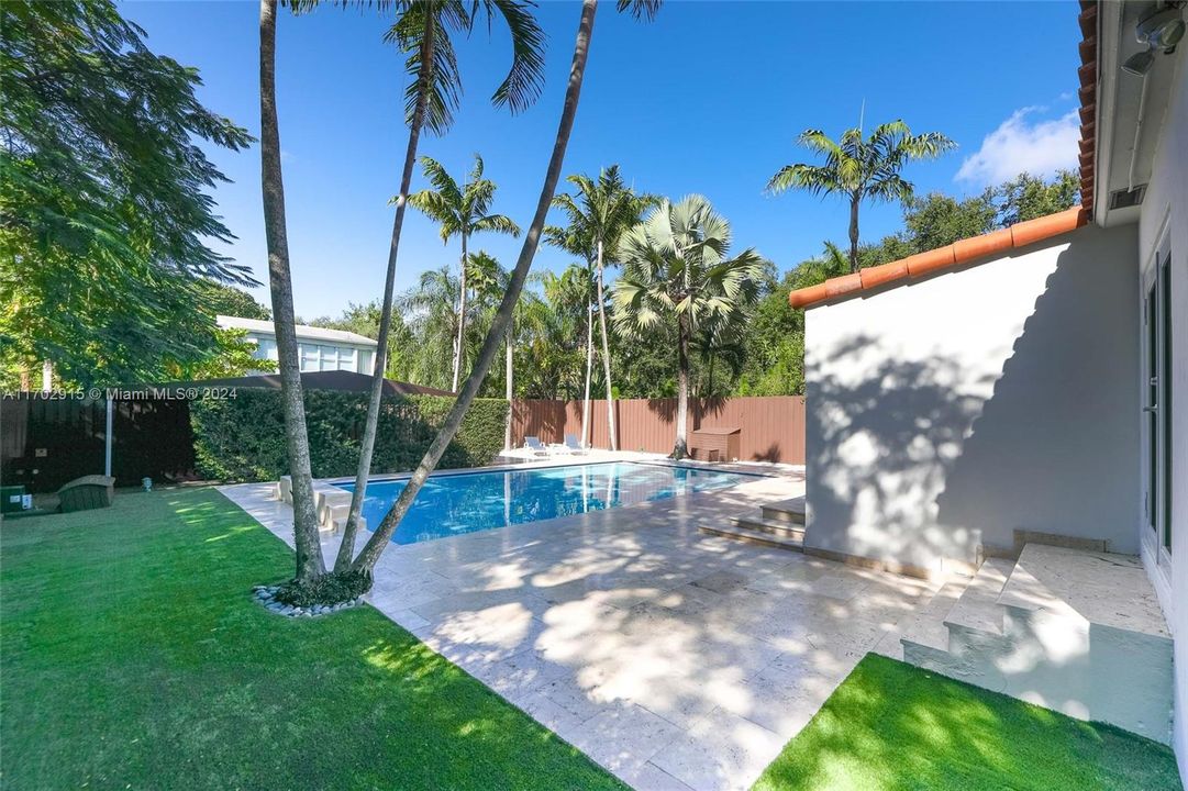 Side pool view and other backyard green areas