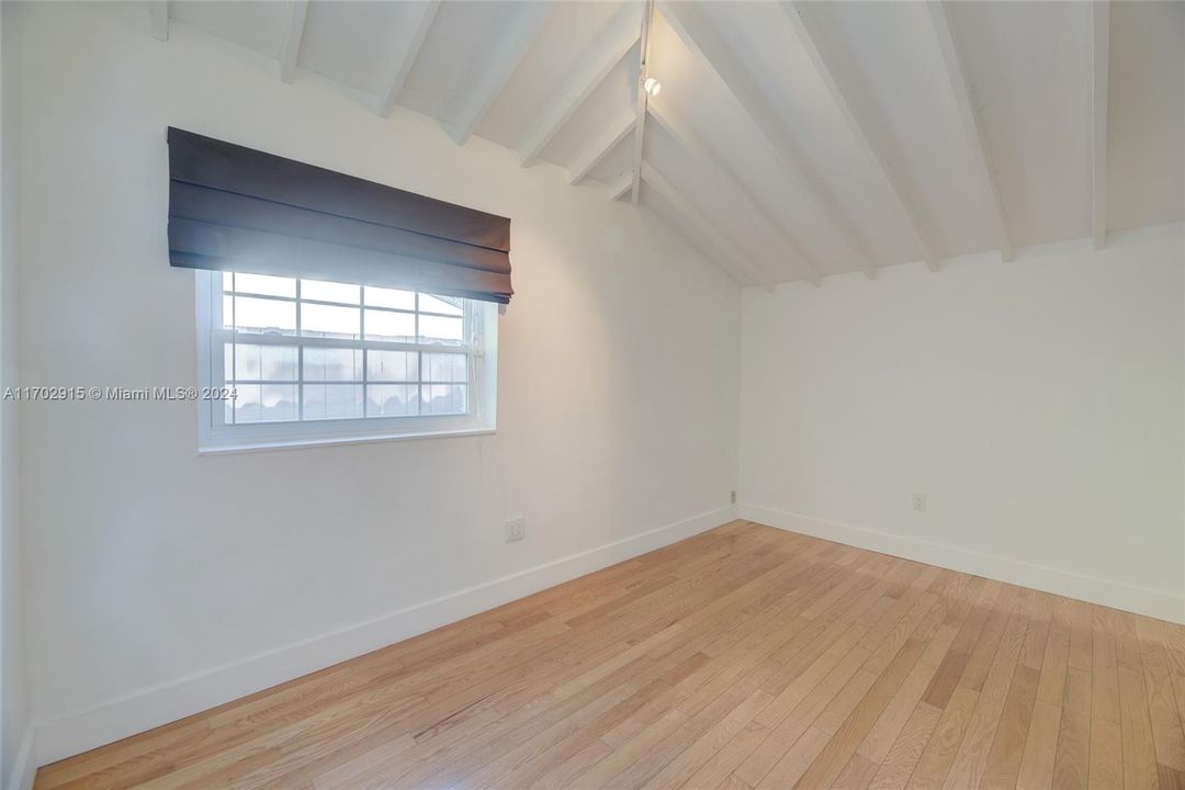 3rd Bedroom - does not have closets - perfect space of an home office or cozy TV Room