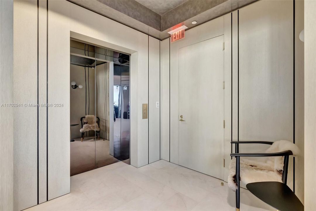 Elevator opens to Private Foyer