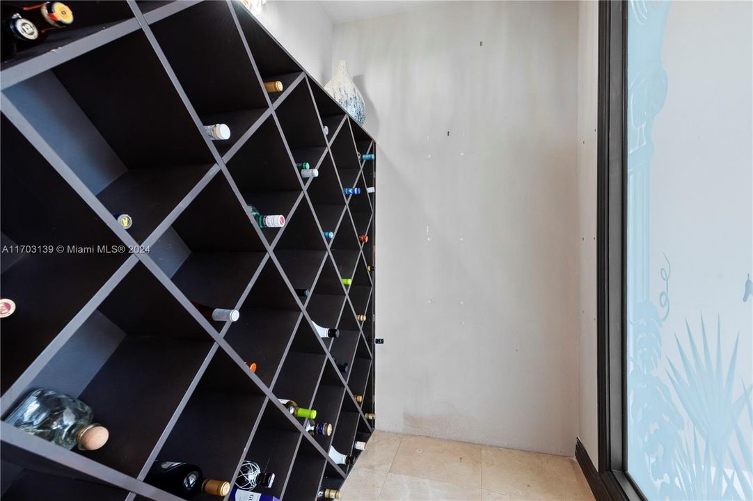 Wine Cellar with glass facing living room