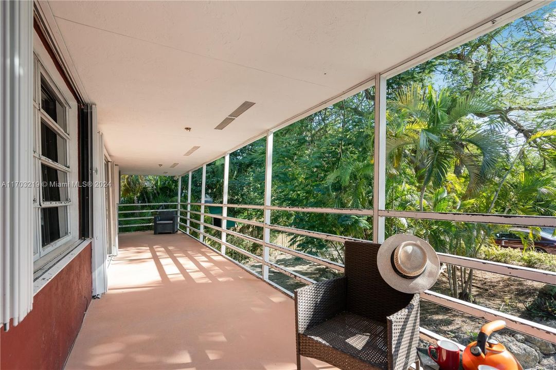 Enormous Veranda offers lush views and is the ideal spot for tropical serenity.