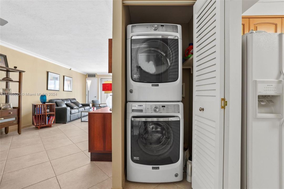 Laundry in unit with full size machines.