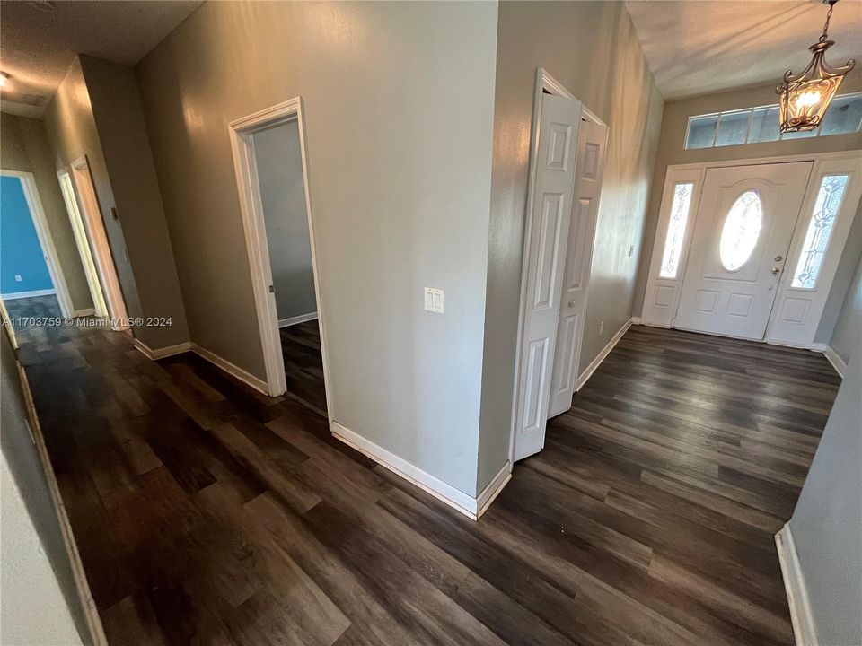 Hallway leads to Primary Bedroom.