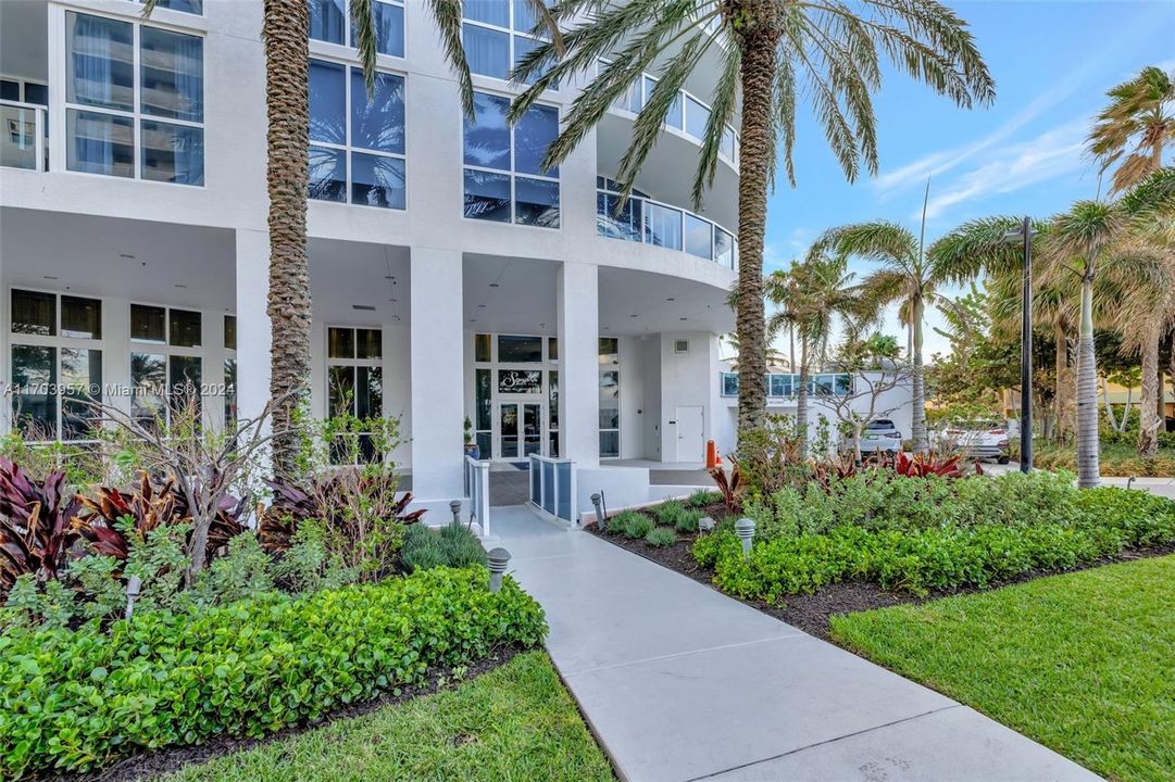 Front Entrance w/ fountains on both sides. Beach side Pool area behind this