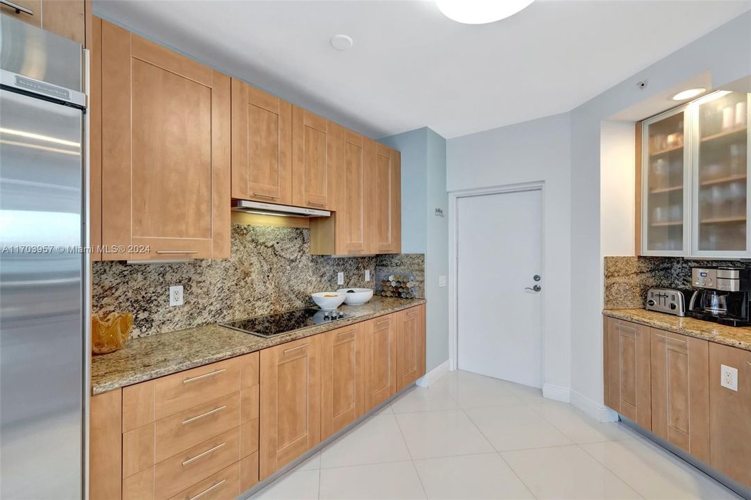 Coffee station on the right w/ glass cabinets