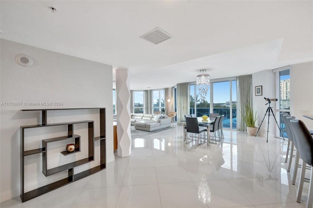 View toward the great room, dining space and kitchen to the right