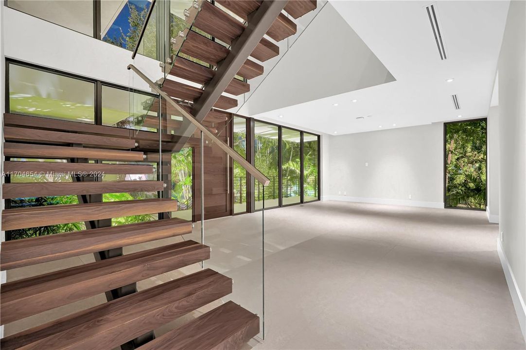 Walnut Staircase to Upper Level