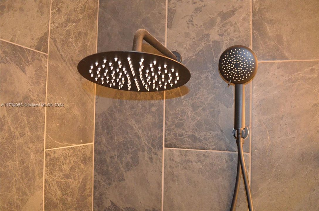 New Rainfall Shower Equipped in Both Bathrooms