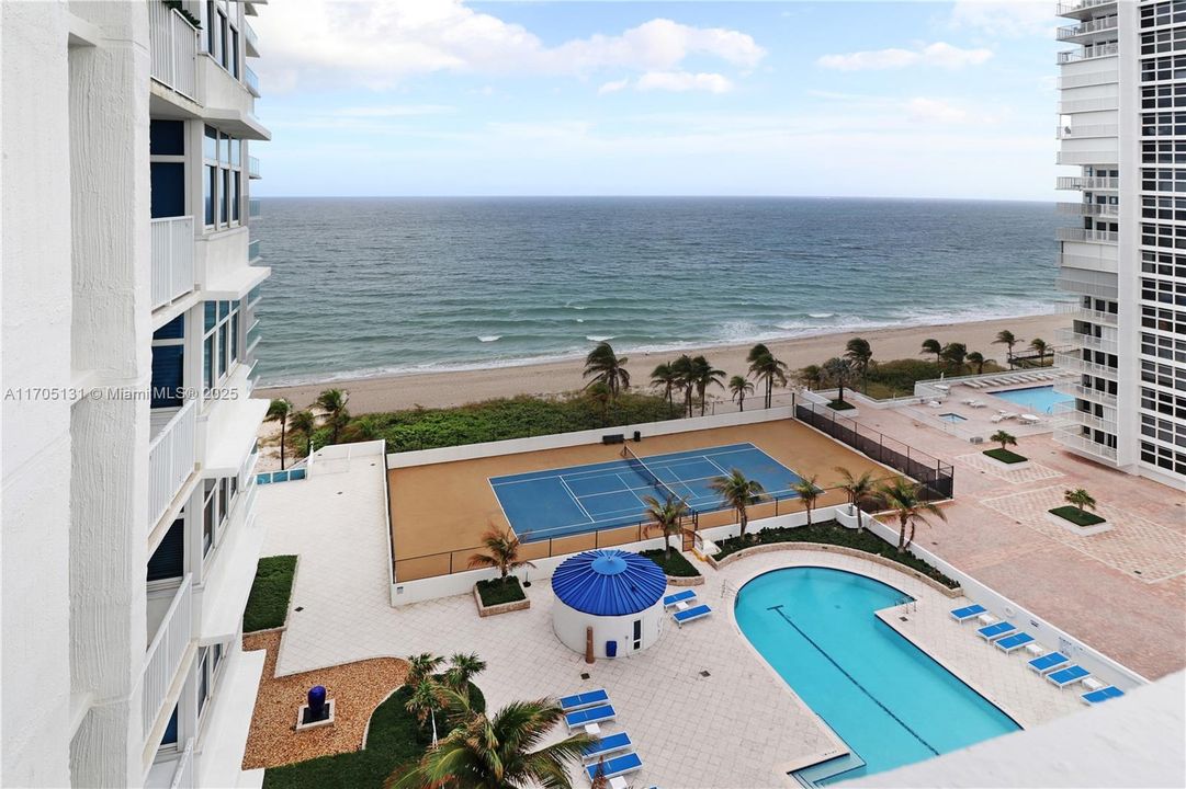 South Balcony overlooking pool and Tennis Court.