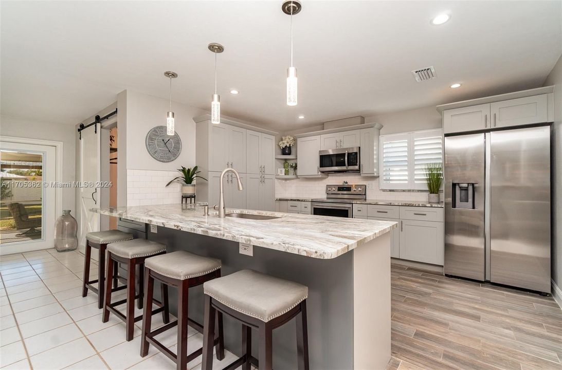 renovated Kitchen with granite countertops