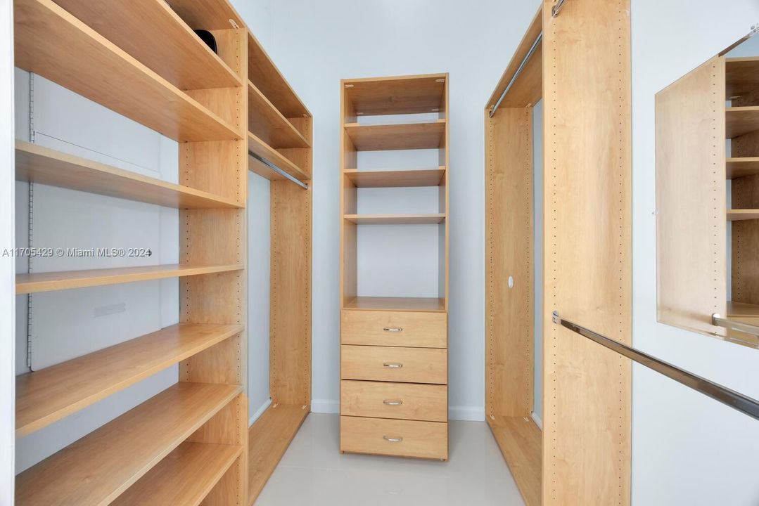 Master walk-in closet for her