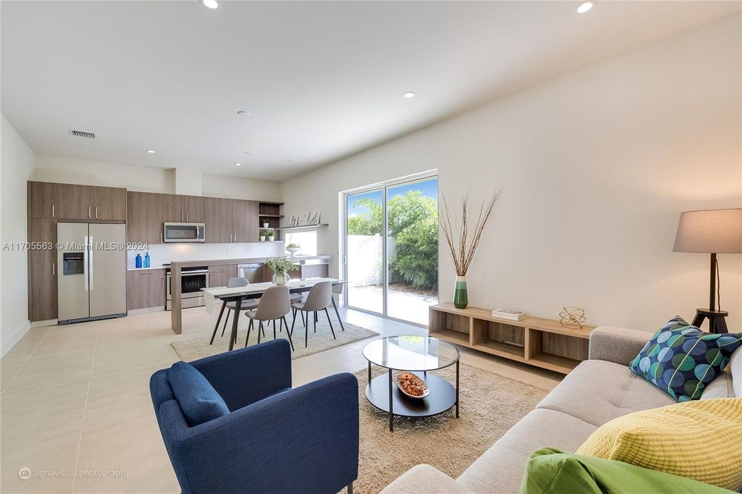 Open concept living room, dining and kitchen