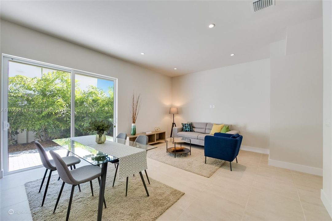 Open concept living room, dining and kitchen