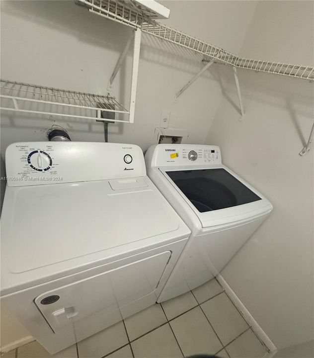 Laundry room inside condo private