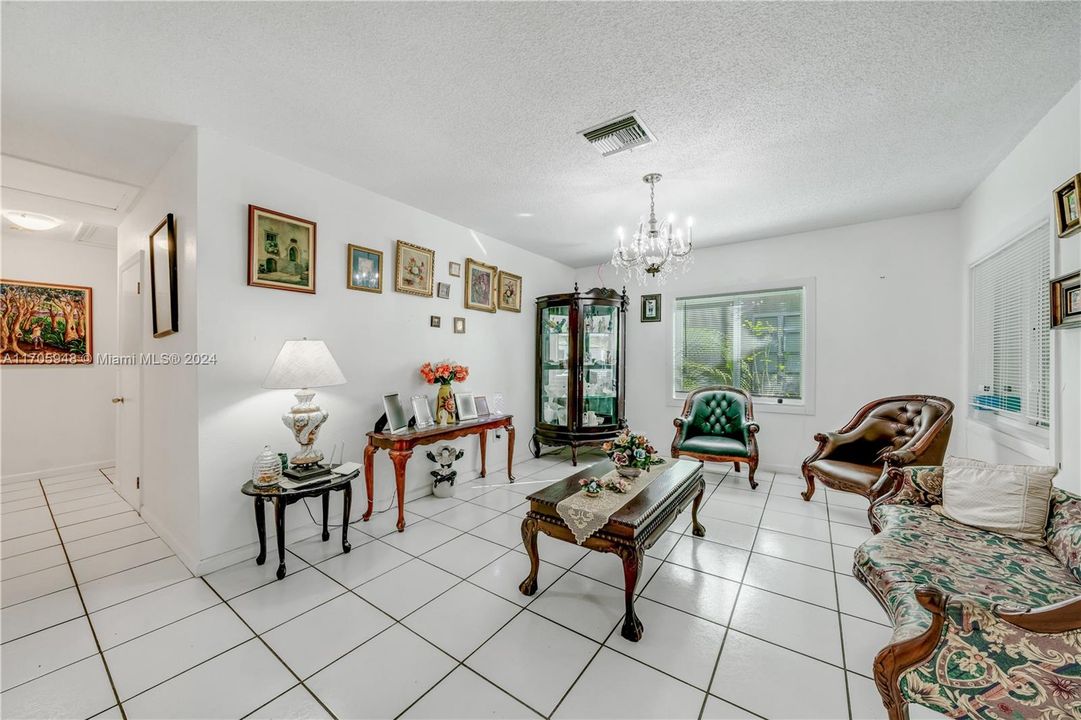 Spacious living room with lots of light.