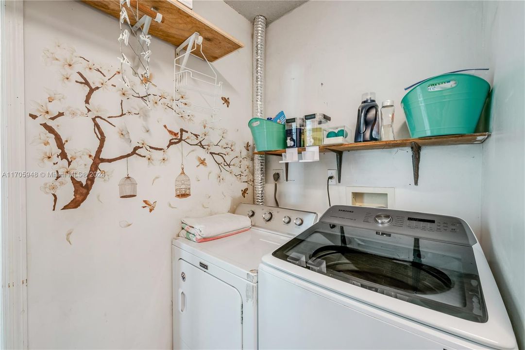 Laundry room with added storage space.