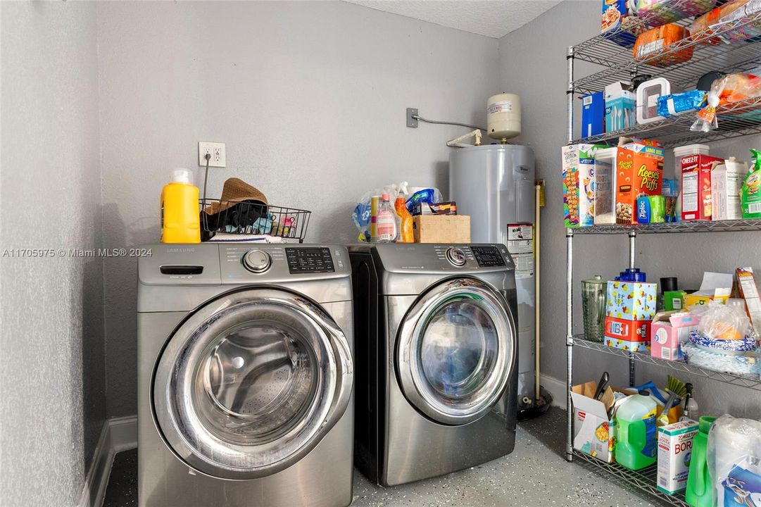 Laarge Laundry Room with front load w/d