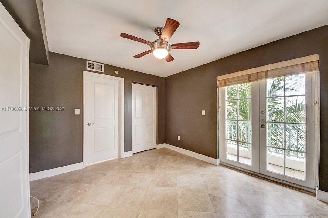 Second bedroom with closet, bathroom and balcony