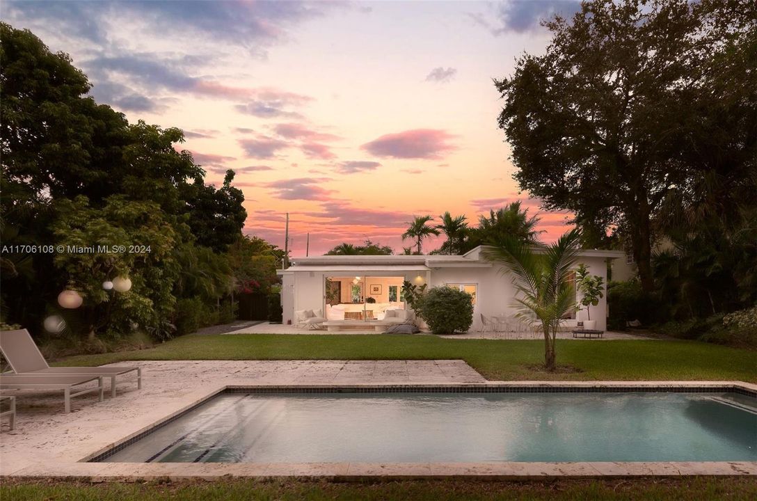 Relax beside this glorious pool and the mature private canopy of greenery