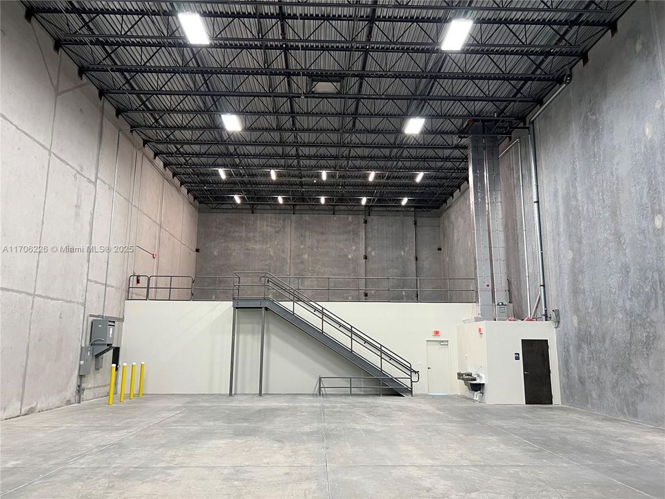 7,047 sq.ft. Warehouse Space. 30 ft. high ceilings. 2nd bathroom in the warehouse