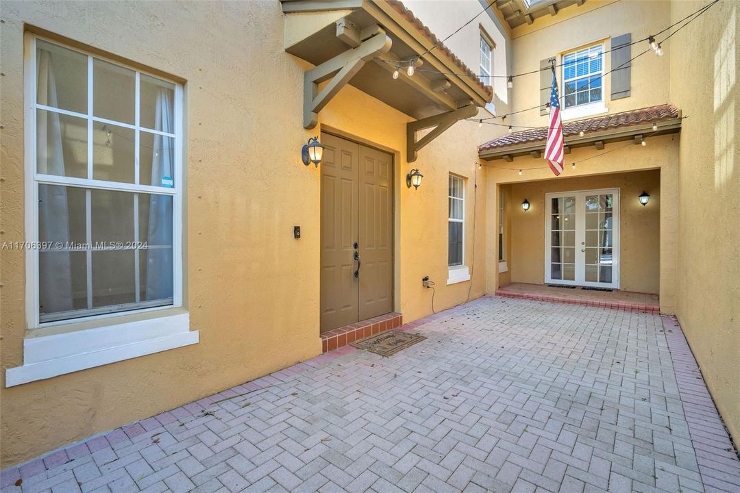 Gated courtyard entrance.