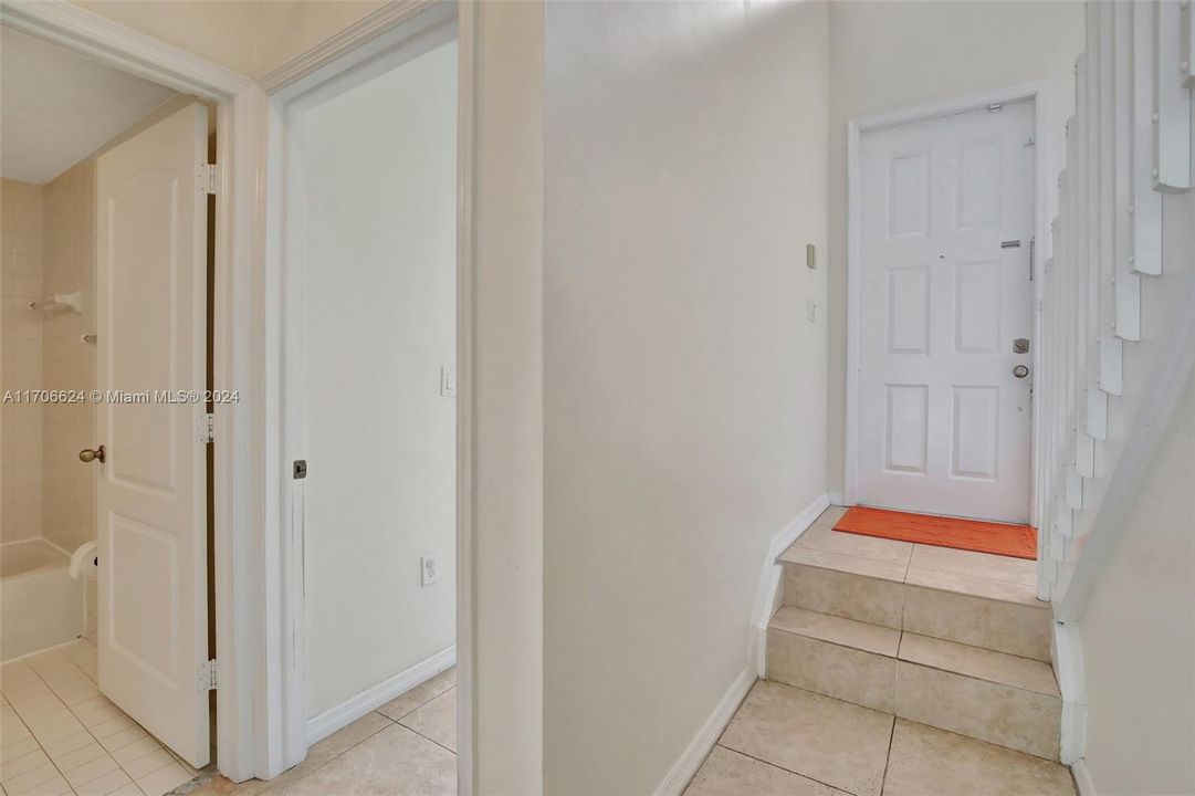 Entrance to downstairs bedroom and bathroom.