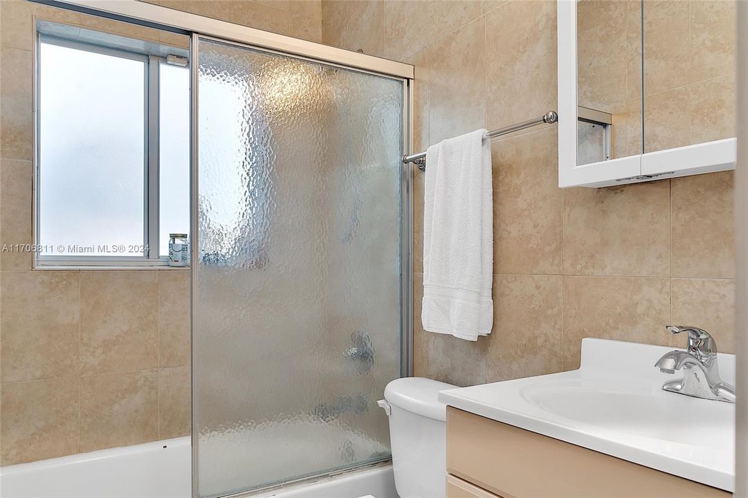 Updated bathroom with window. Unit comes with tankless water heater.