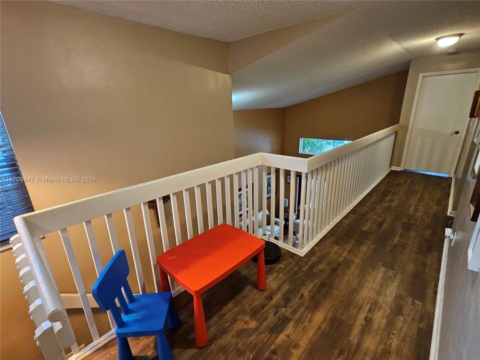 hallway to primary bedroom