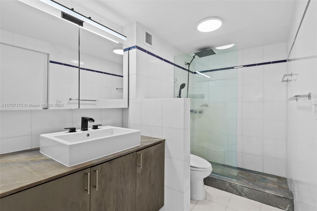 Primary bath featuring stand alone shower