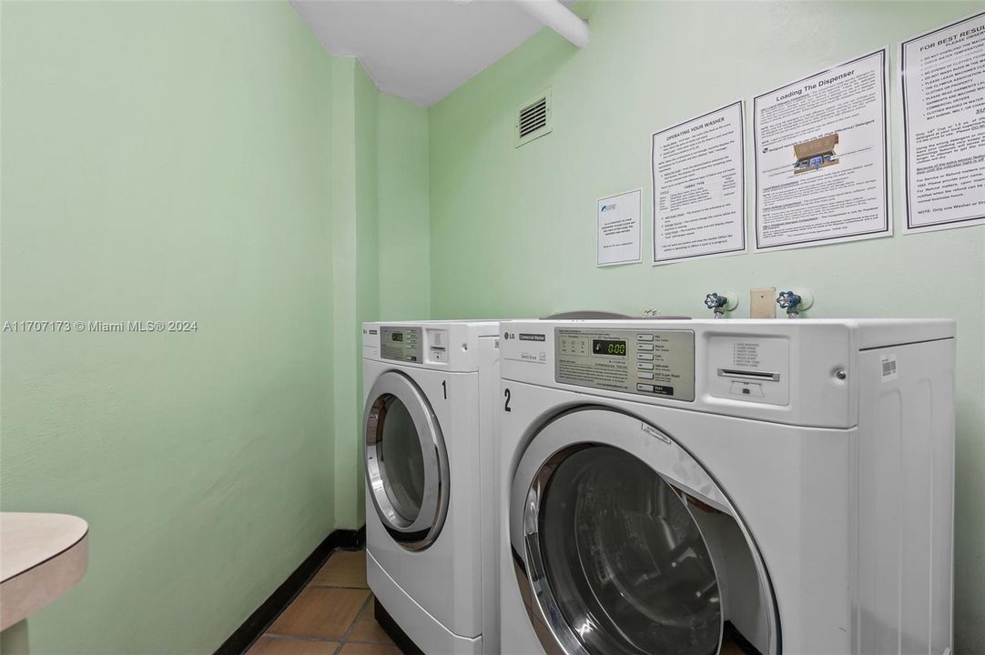 Shared laundry located directly across from unit