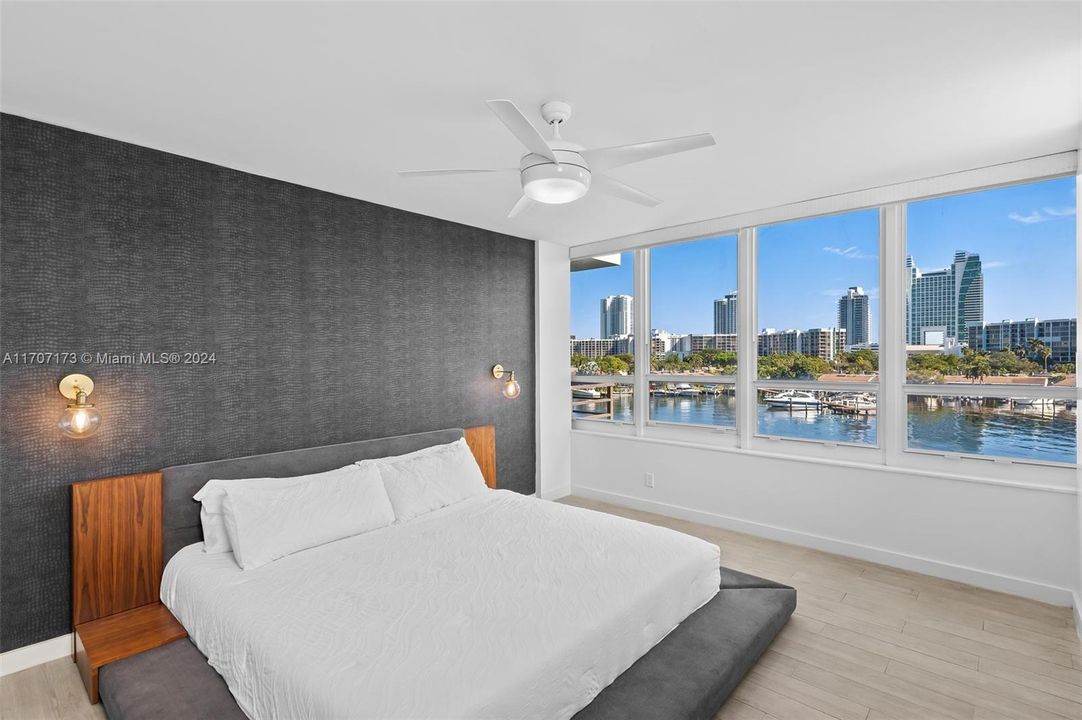 Primary bedroom with gorgeous bay & intracoastal views