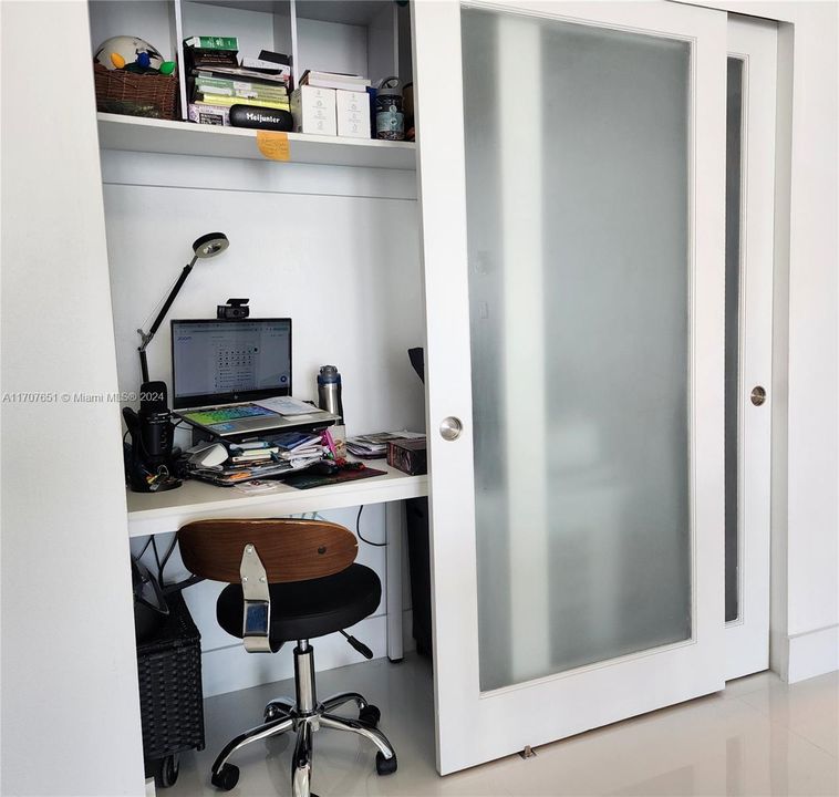 Closet With Custom Inset Glass Doors & Hidden Office Space