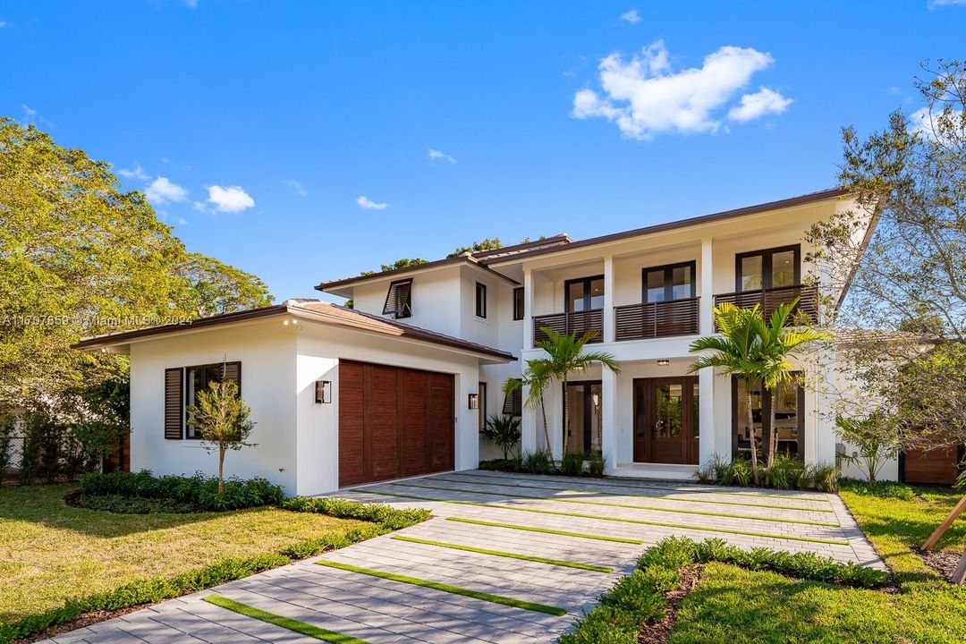 Beautiful Paved Driveway And Double-Height Garage