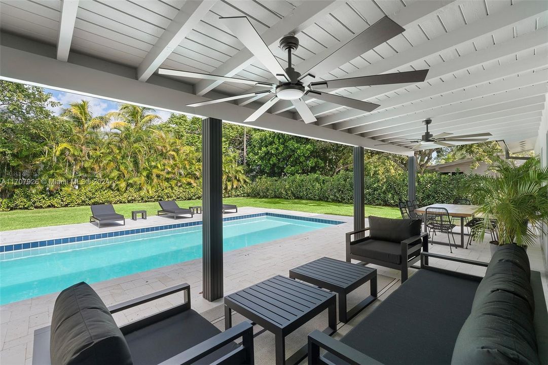 Spacious covered terrace, perfect for outdoor dining and relaxation