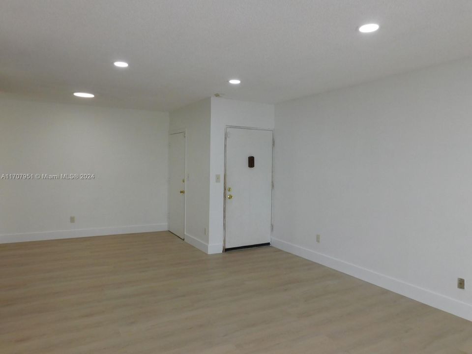 Living room view to entry way.