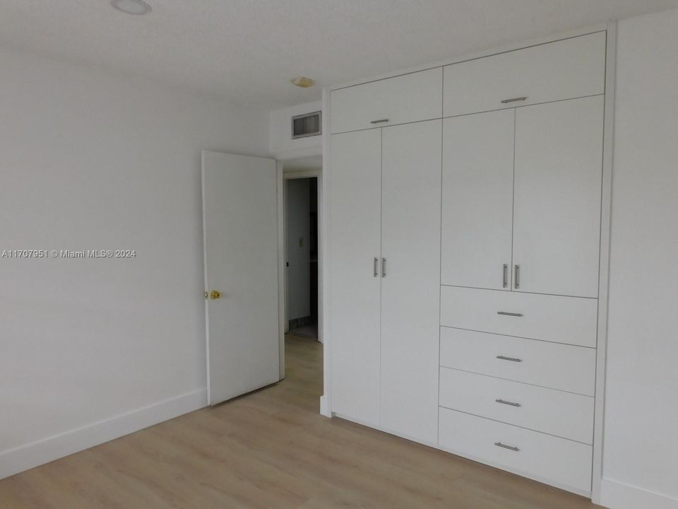 2nd bedroom view to entry way.