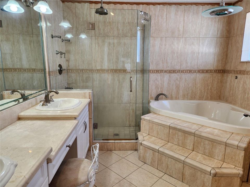 Master bath with double sink and shower