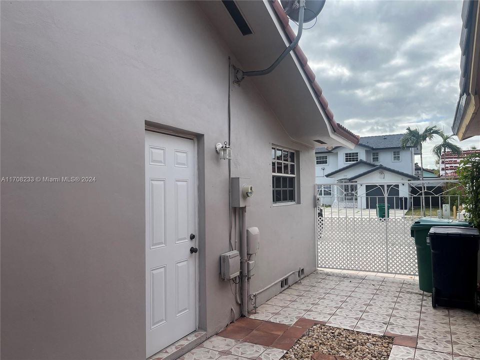 side of house, door from garage