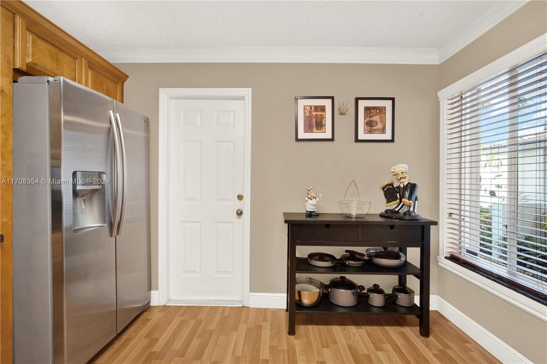 Door in the kitchen leads to the garage and laundry.