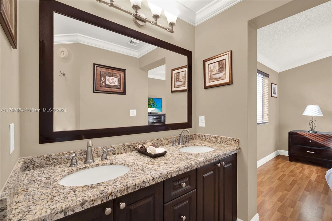 Master bedroom's bathroom with double sink.