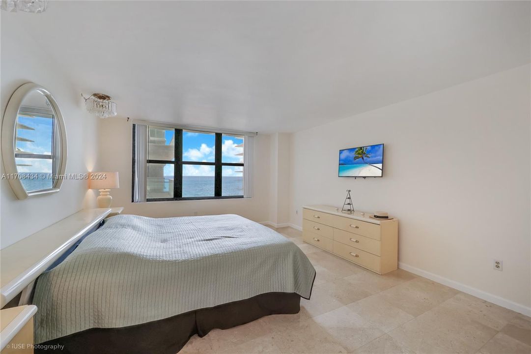 A large Master Bedroom in-suite looking at the Ocean waiting for your new decoration...3 Closets