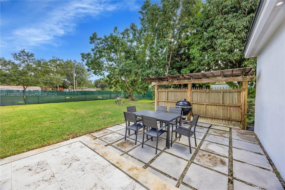 Side yard for outdoor dining.