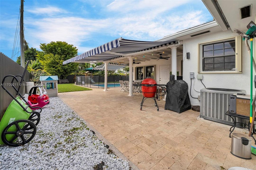 new pavers on back patio and around pool