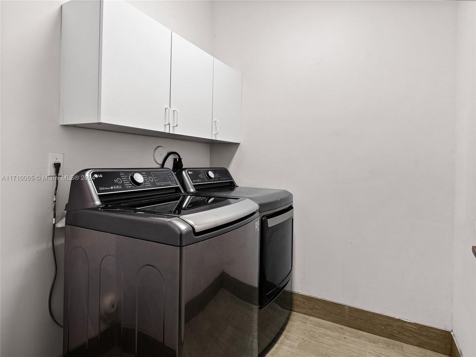 Laundry Room with Built-in Cabinets