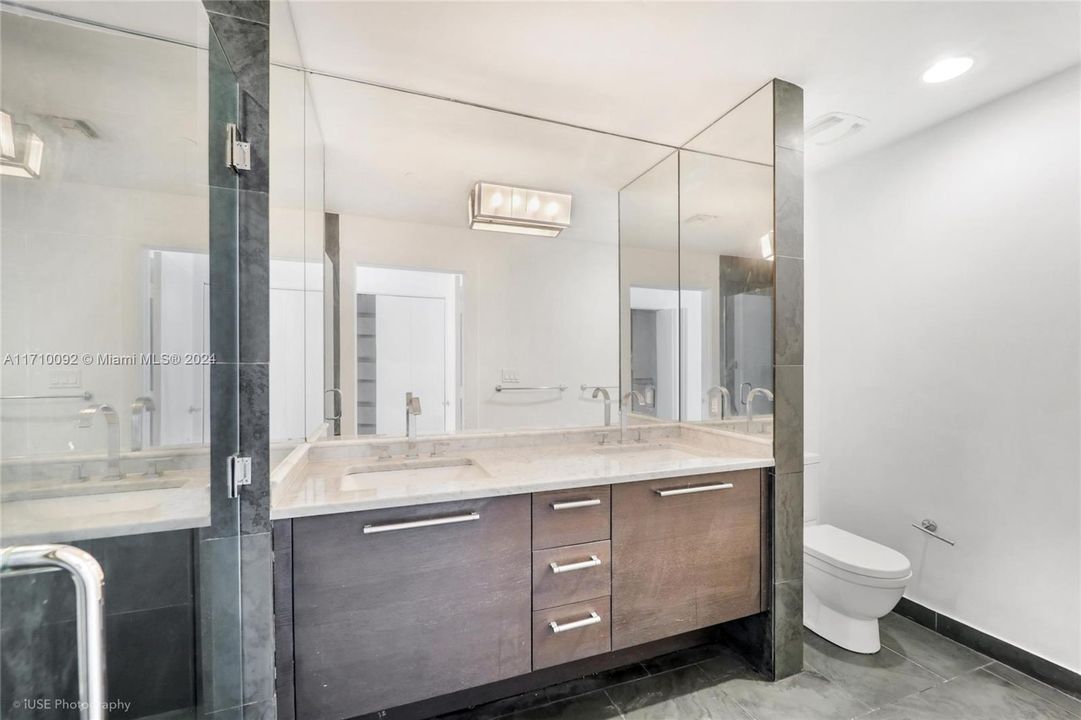 Master Bathroom with 2 sinks & shower