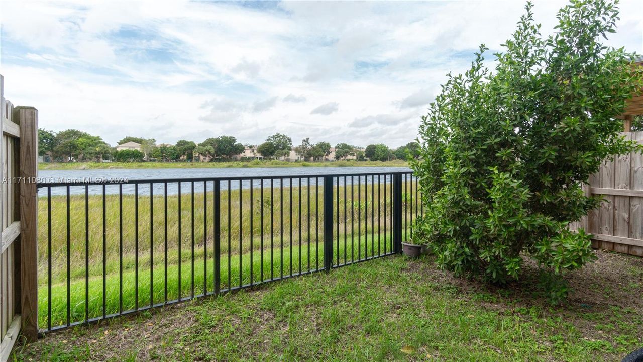 Backyard: fenced, on the water