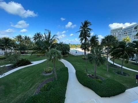 Gardens, pools, tables with umbrellas, bathrooms & gazebo area