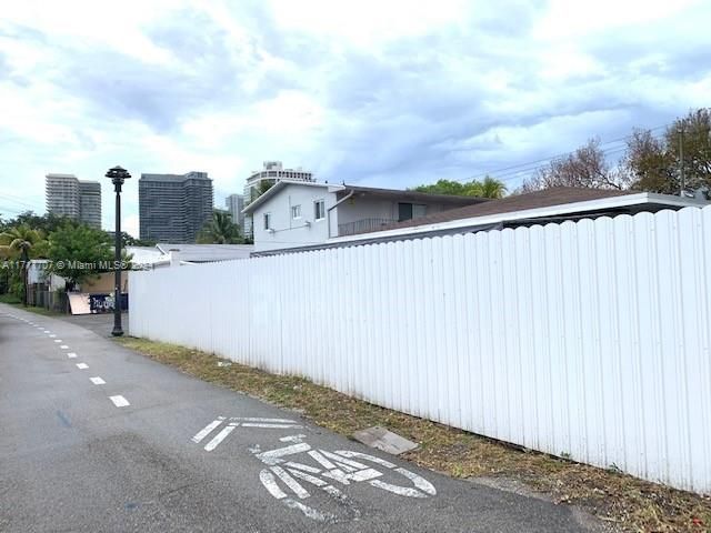 ALLEY AT THE BACKSIDE OF THE PROPERTY